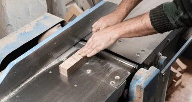 benchtop jointer smoothing wood edge for accurate flattening