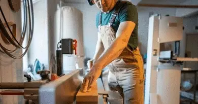 carpenter using a jointer