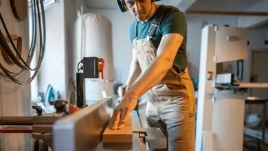 carpenter using a jointer