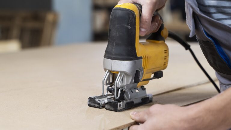 man working cutting mdf board scaled
