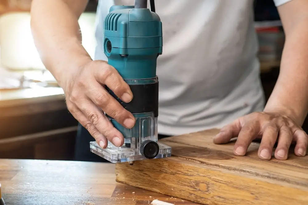 man working with a router