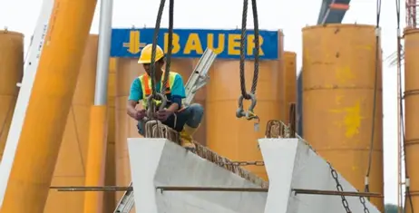 a man working with a bauer tool